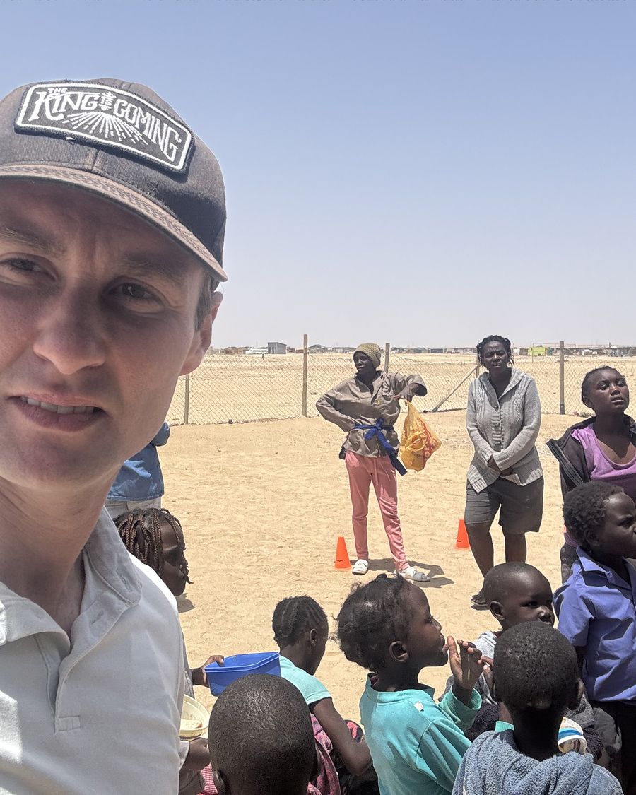 In Namibia with a 'King is Coming' cap